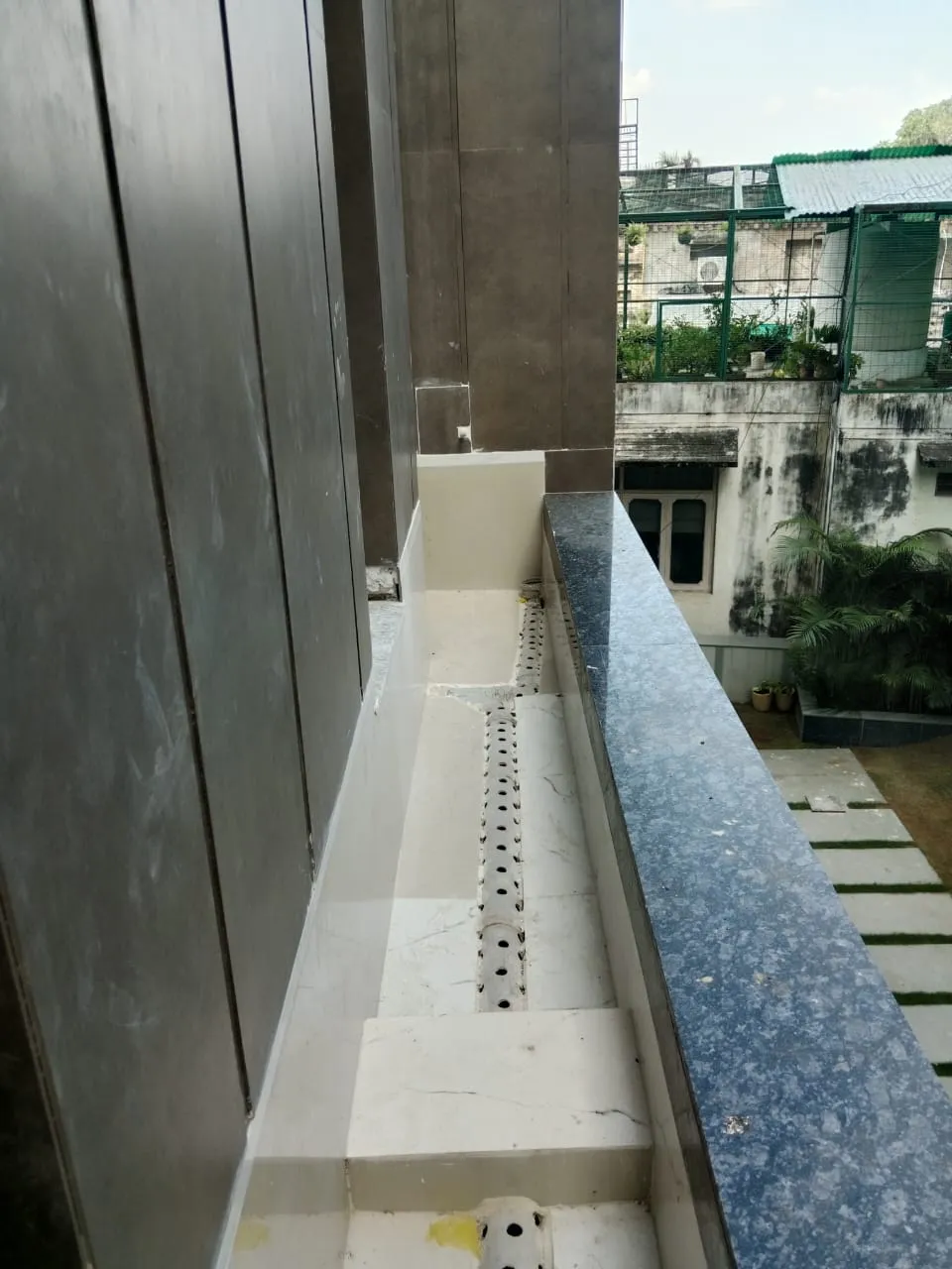 Balcony planter trough with drainage holes ready for planting