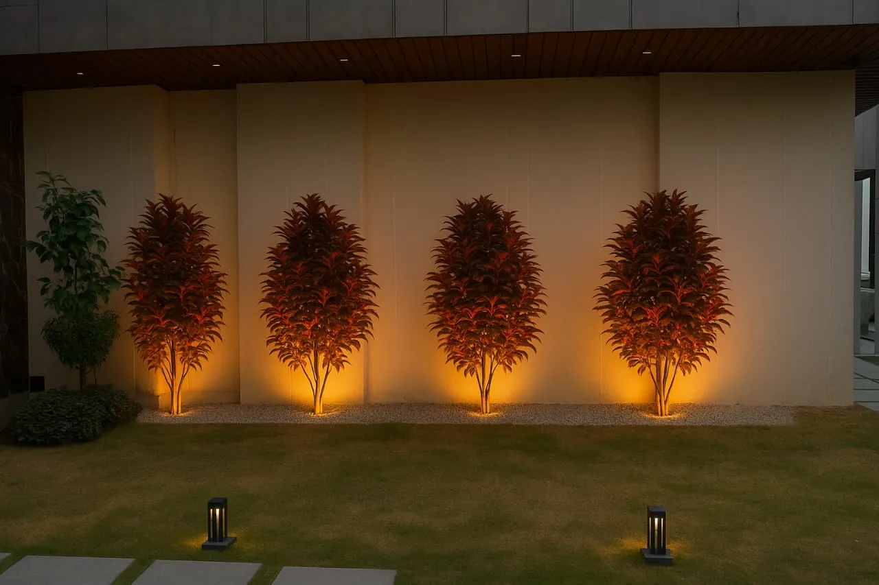 Concept design: uplit red foliage trees against a white feature wall