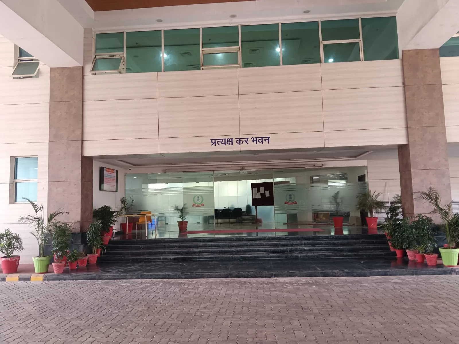 Potted plant landscaping at Pratyaksh Kar Bhawan entrance, Lucknow