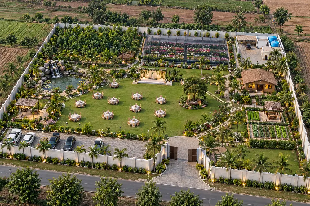 Concept rendering of resort development with event lawn, waterfall pond and cottages